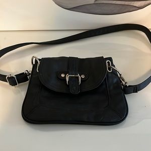 Black shoulder or crossbody purse.